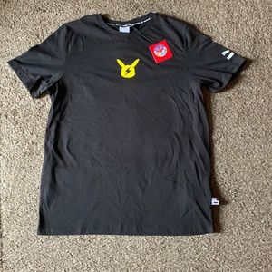 Brand New PUMA × Pokémon: Pikachu Puma Black Jersey T-Shirt - Adult Large